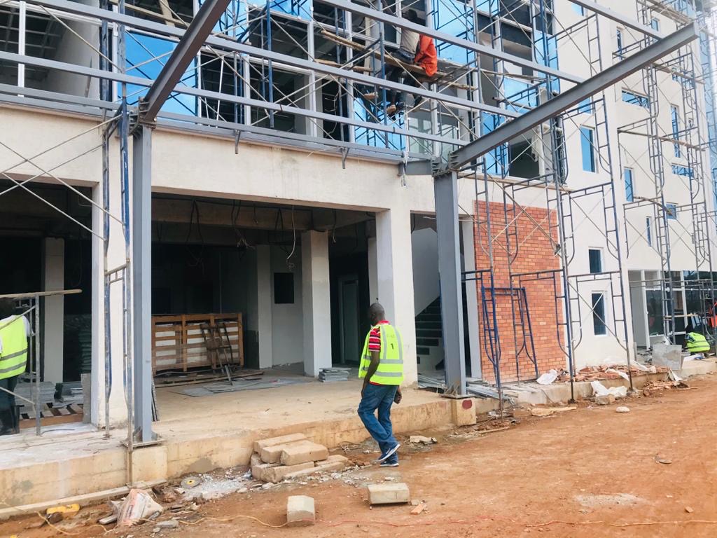 Site supervisor overseeing steel-frame construction
